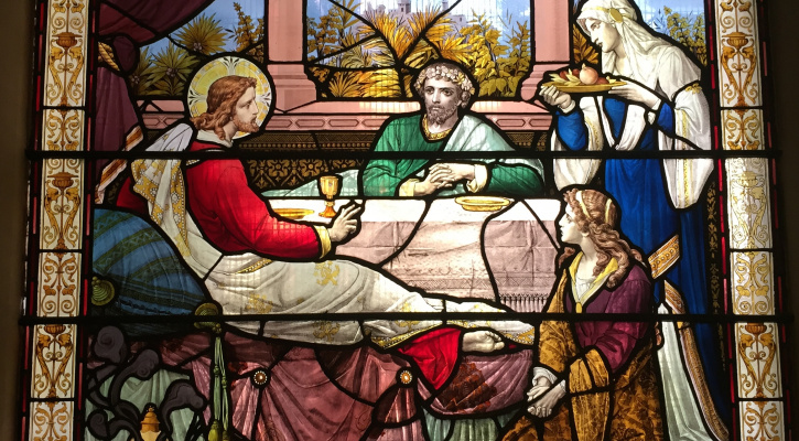 Stained glass window of Saints Martha, Mary, and Lazarus