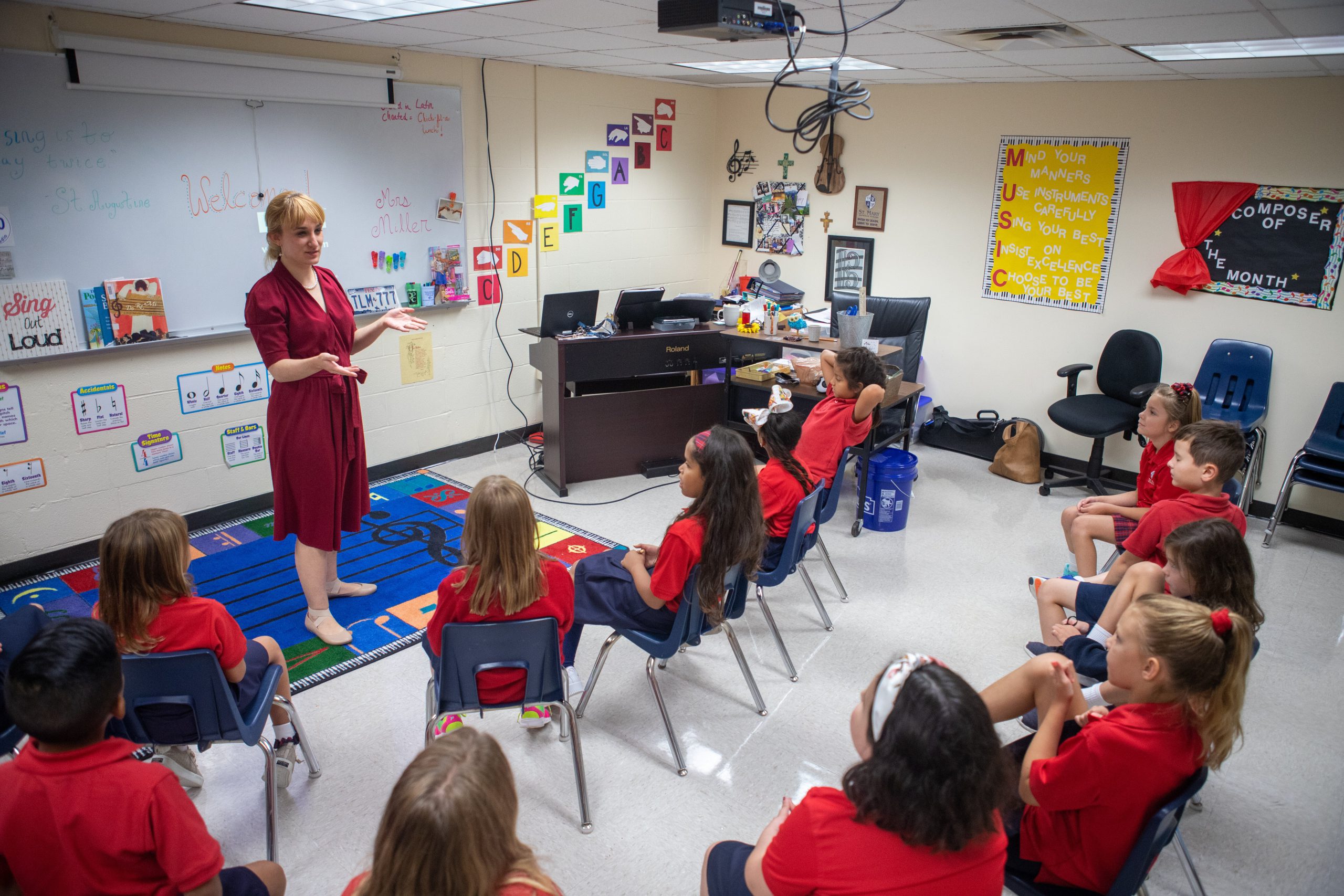 Megan Miller, a music teacher and orchestra director, teaches during an Aug. 12, 2019, class session at St. Mary Catholic School in League City, Texas. Miller was one of nearly 75 educators to attend a recent continuing education and development day for art and music teachers hosted by the Catholic Schools Office and the Co-Cathedral of the Sacred Heart in Houston. (CNS photo/James Ramos, Texas Catholic Herald)