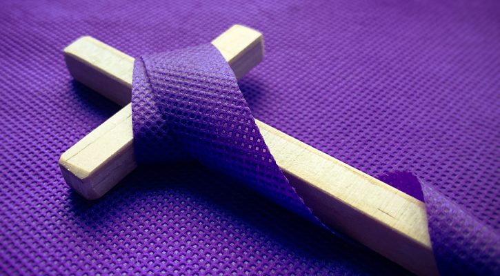 Cross with a purple ribbon