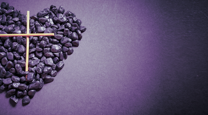 Cross inside a purple heart