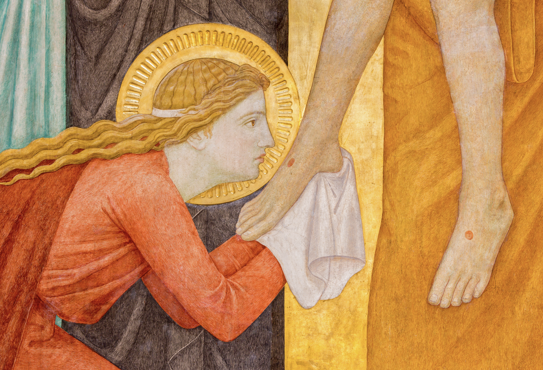 Mary Magdalene kisses jesus' feet